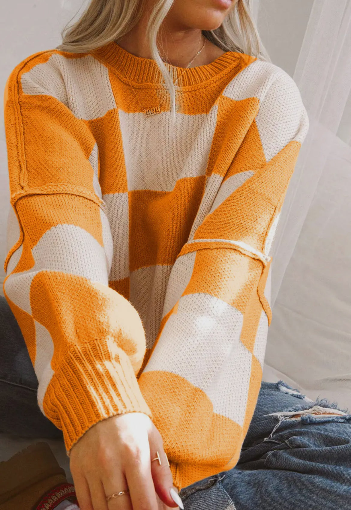 Checker Exposed Seam
Crewneck Sweater