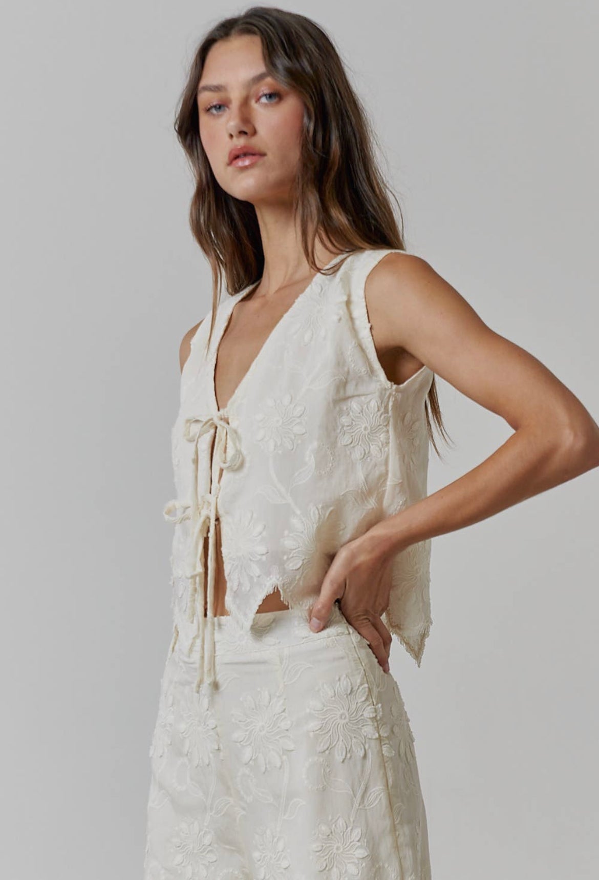 Sofia | Floral Embroidery Front Tie
Sleeveless Top