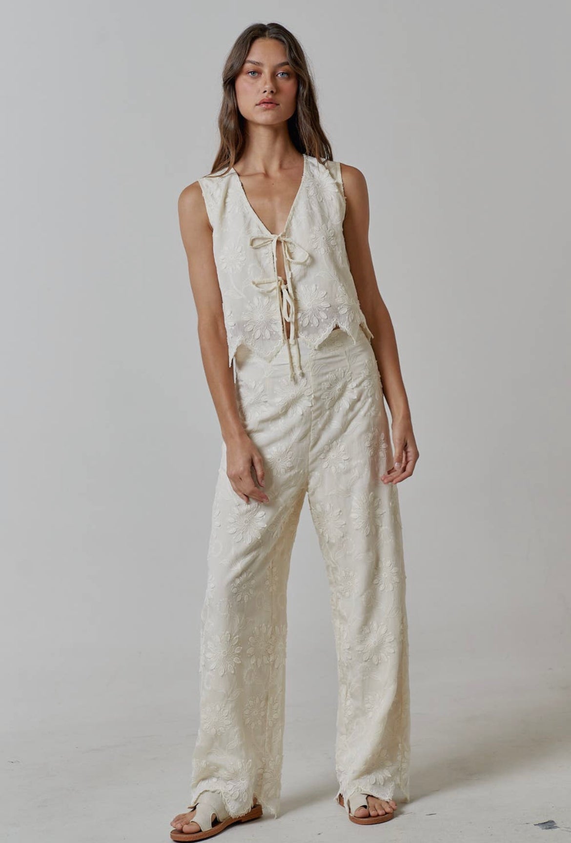 Sofia | Floral Embroidery Front Tie
Sleeveless Top